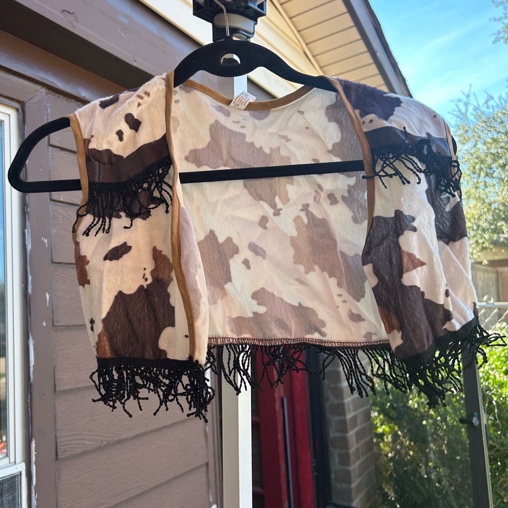 Making believe kids cowboy and cowgirl vest